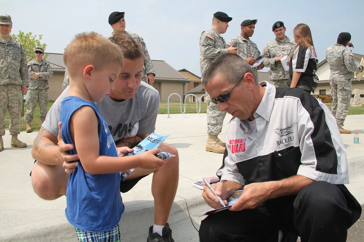 Kansas National Guard static displays drag racers and vehicles