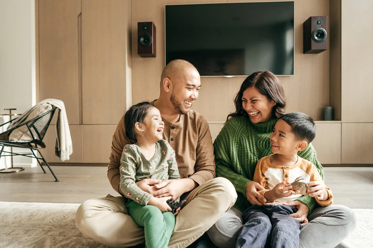 Smiling family of four