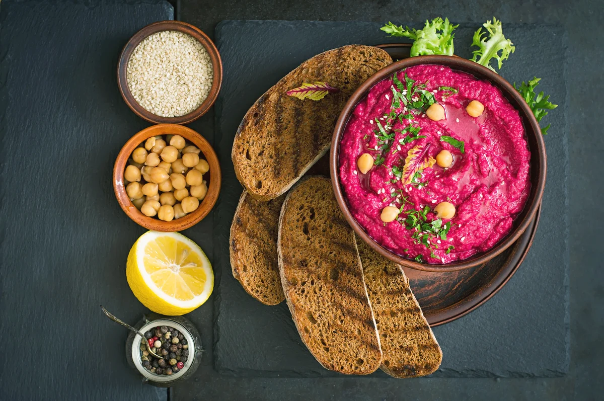 Beet hummus on table