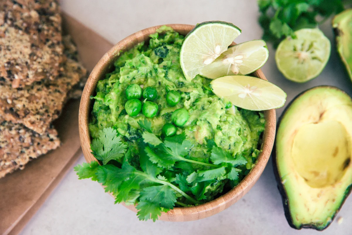 Guacamole with peas, avocado, lime, coriander and crisp bread