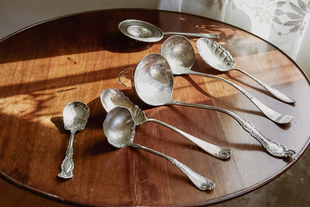 Spoons And Ladle On Wooden Table