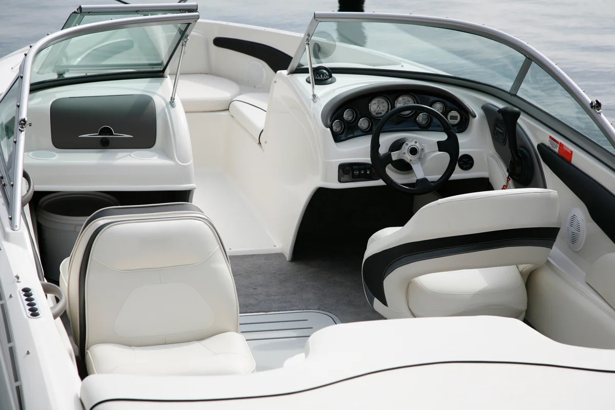 cockpit of boat with white vinyl seats