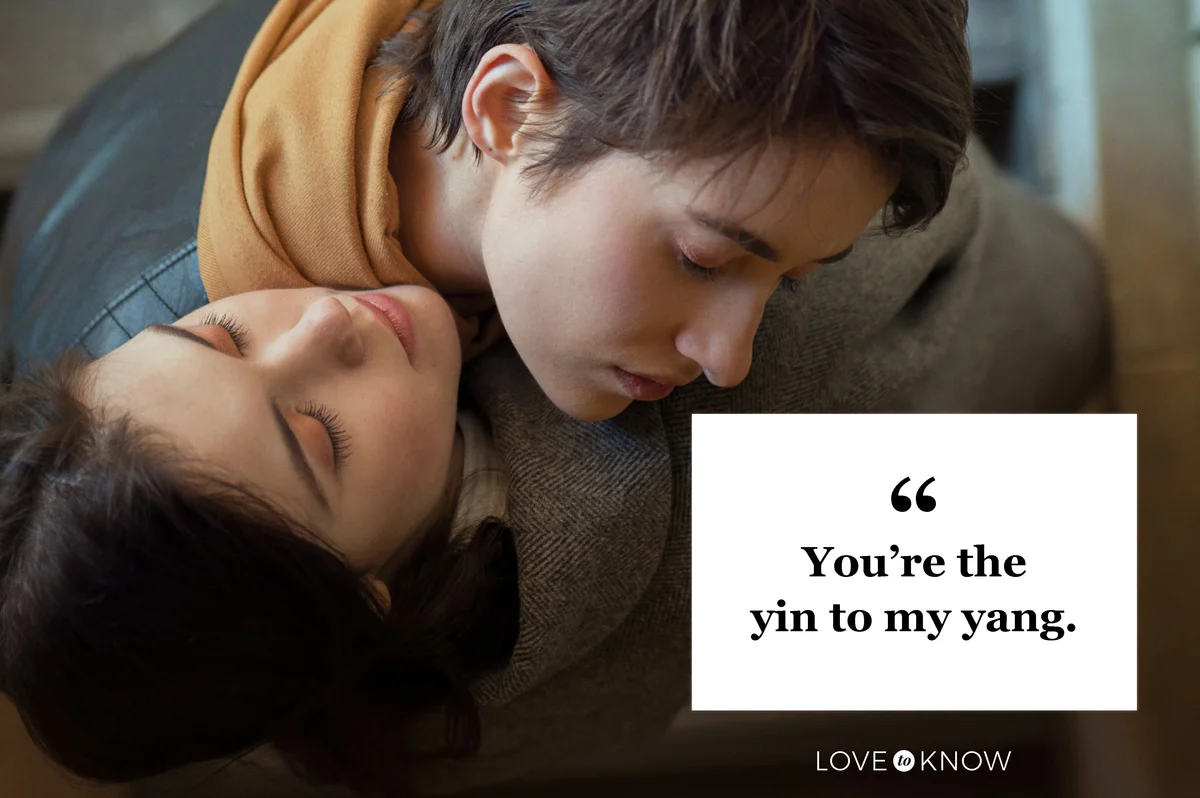 Two young women embrace each other