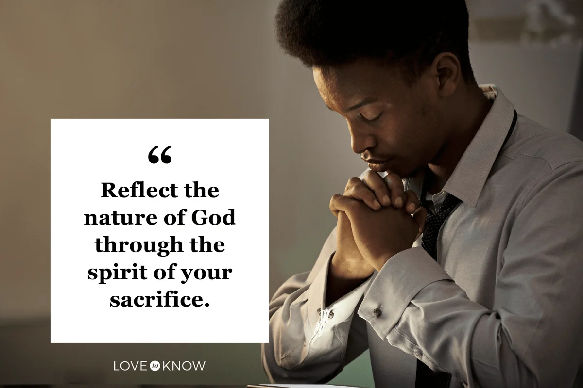Young male businessman praying