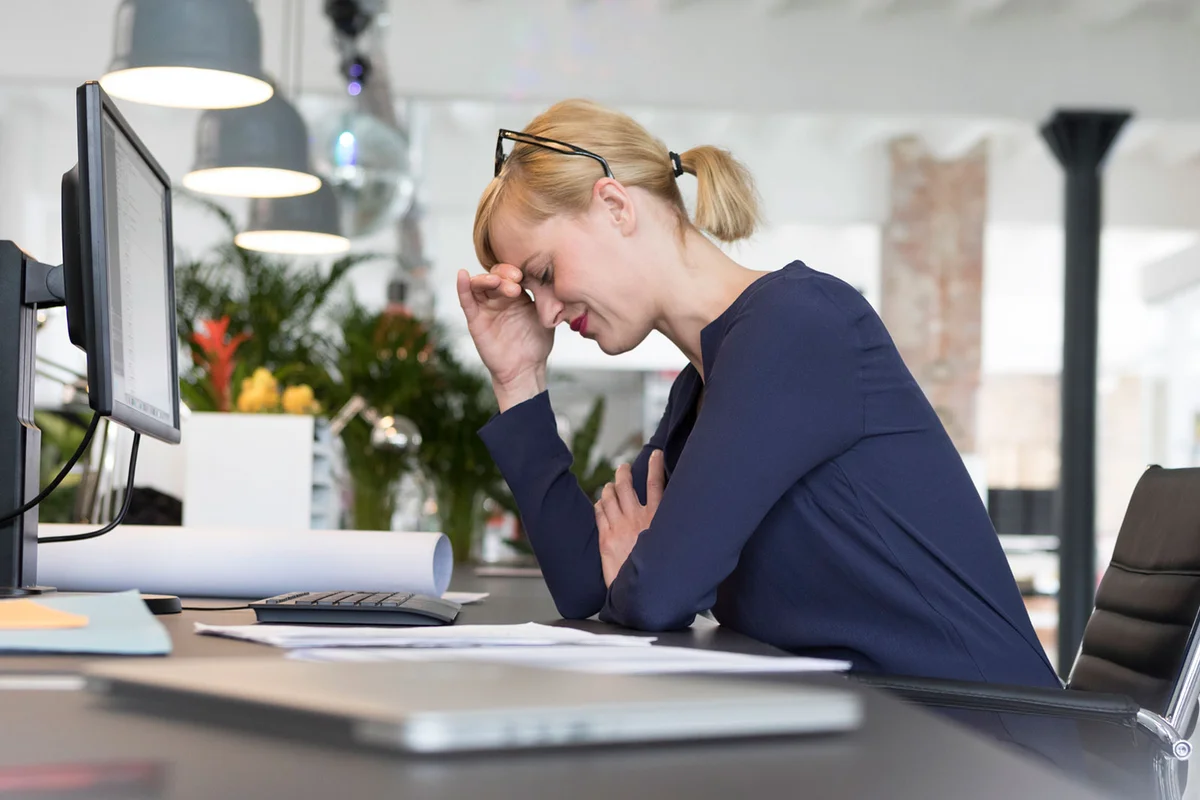 woman grieving at work