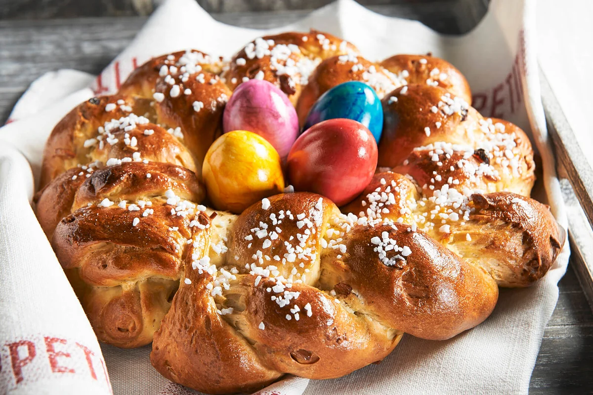 An Easter wreath with sugar nibs and coloured eggs
