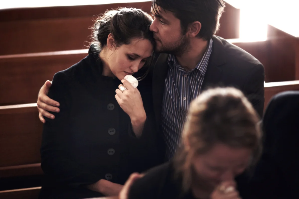 Filled with sorrow at their loss