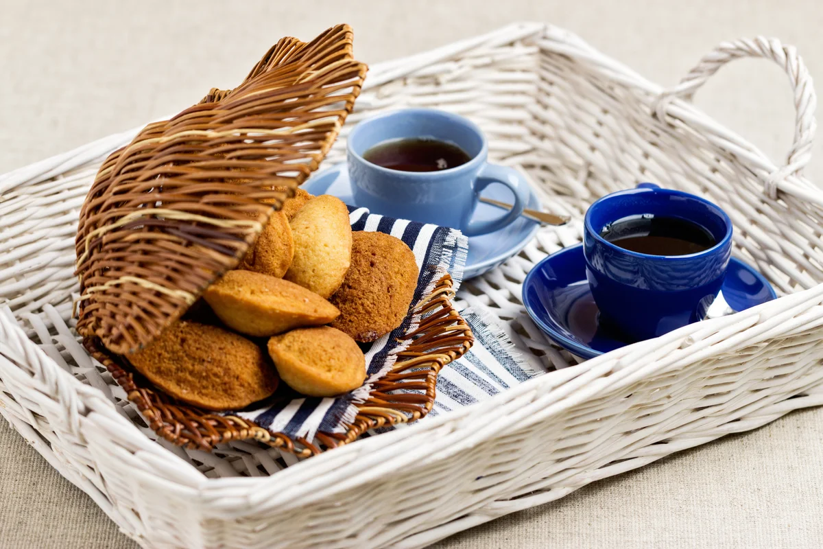 madeleines and tea on tray