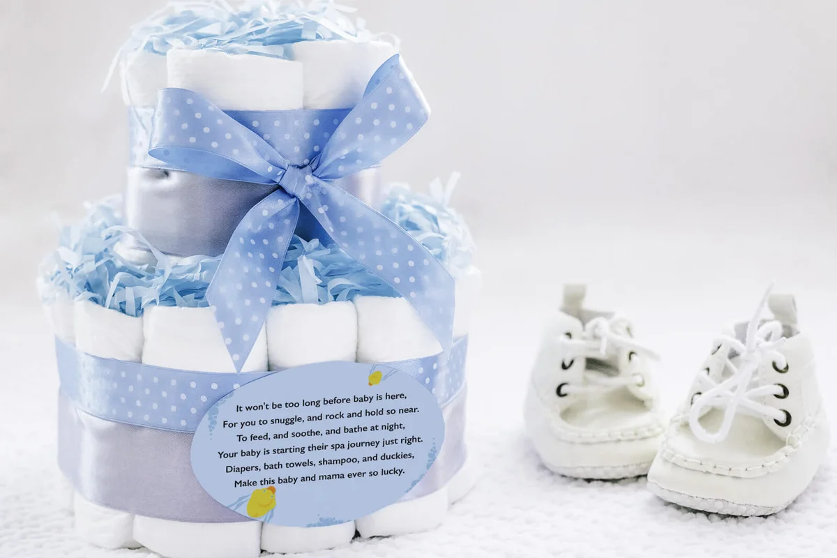 Present cake with diapers for newborn baby