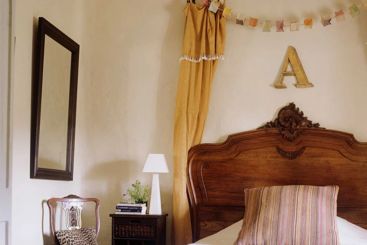 vintage playful headboard in bedroom