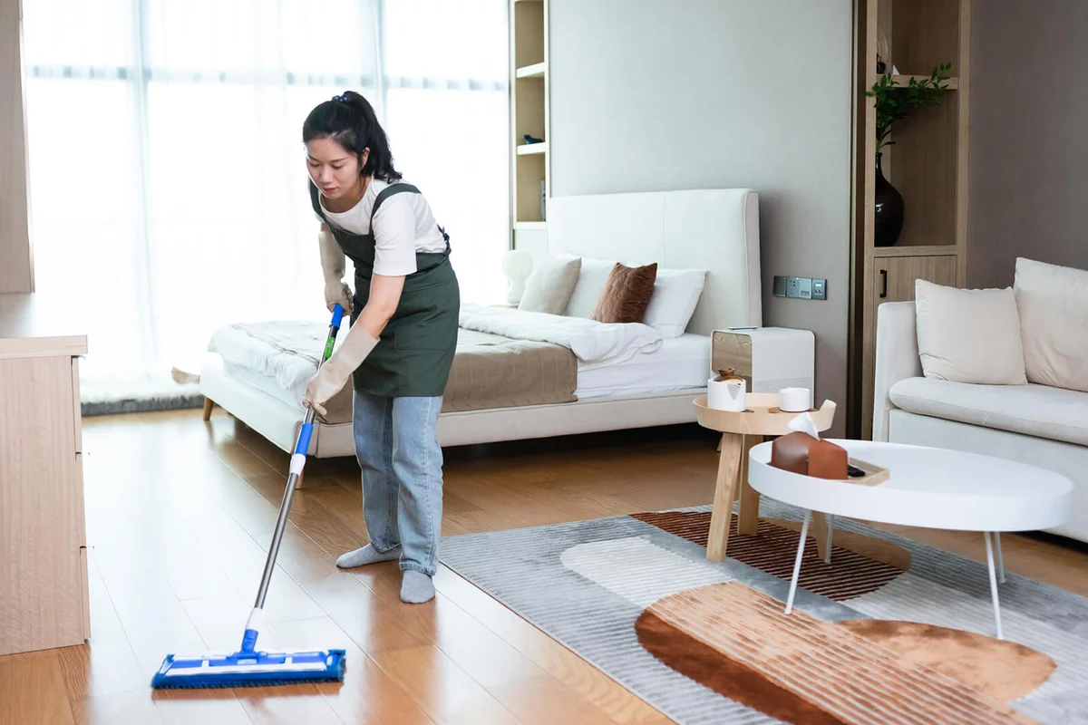 Woman Cleaning Floor With Mop