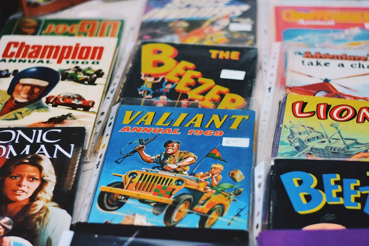 Classic Comic books on display originally from Unsplash