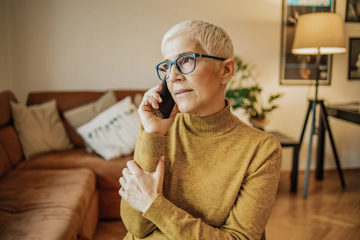 woman on phone researching social security death benefits