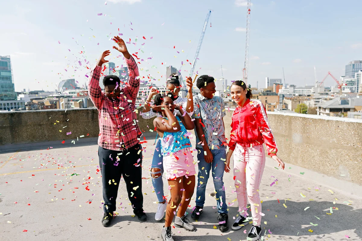 Teenagers having a rooftop party celebration