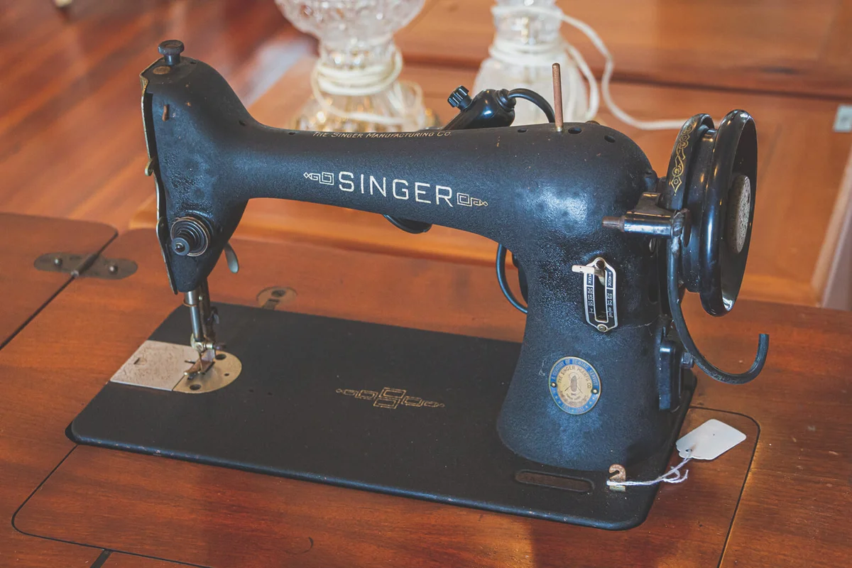 A vintage Singer foot operated sewing machine | Photo 219055042 © Hguerrio | Dreamstime.com
