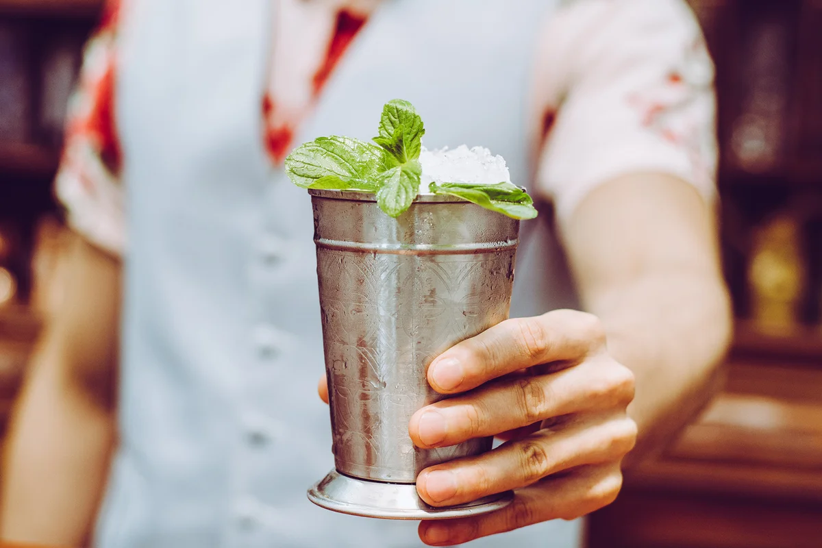 Person Holding Drink