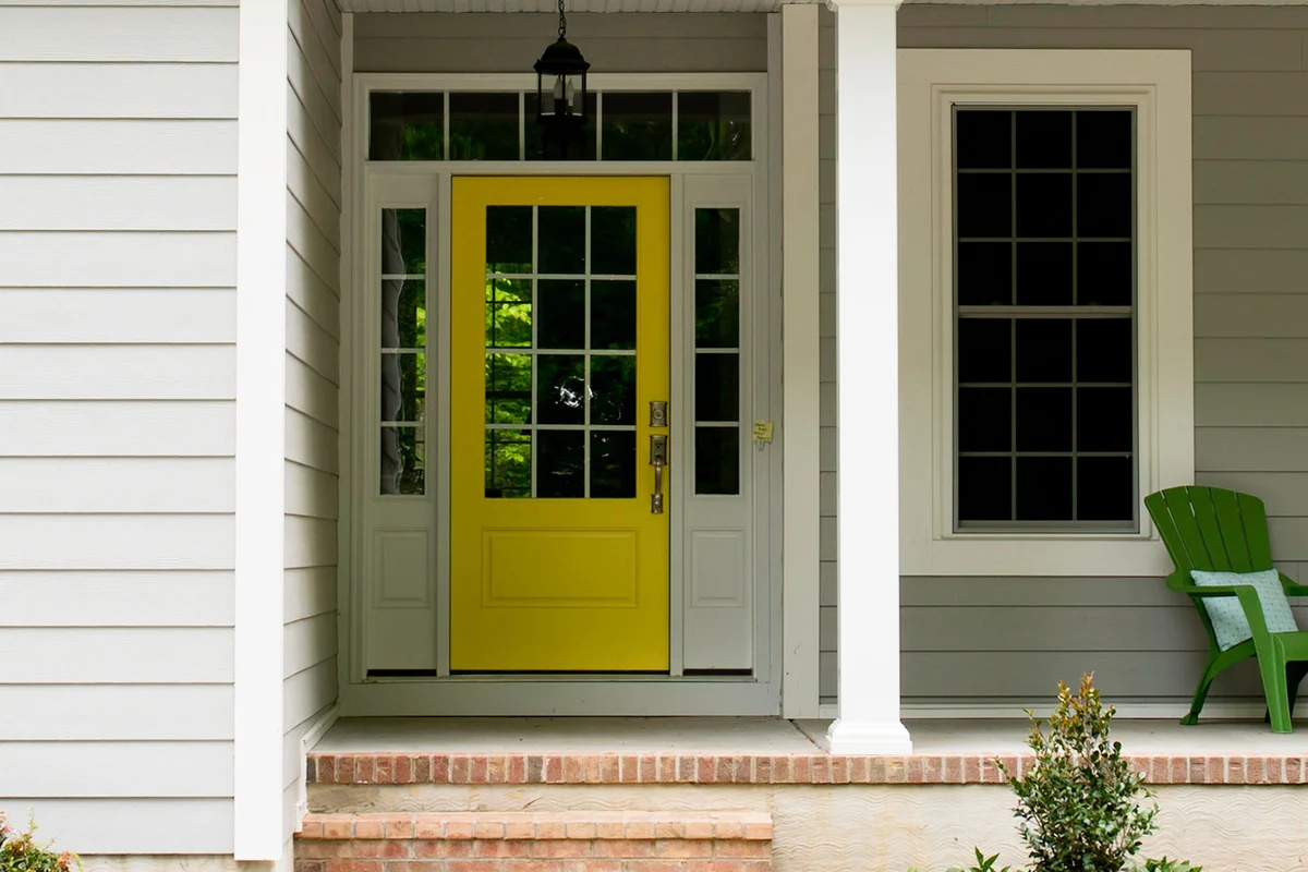 yellow front door of house