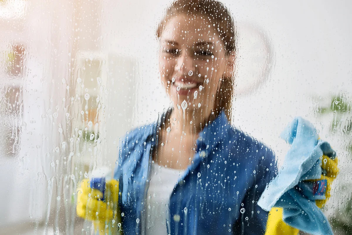spray glass shower door with cleaner
