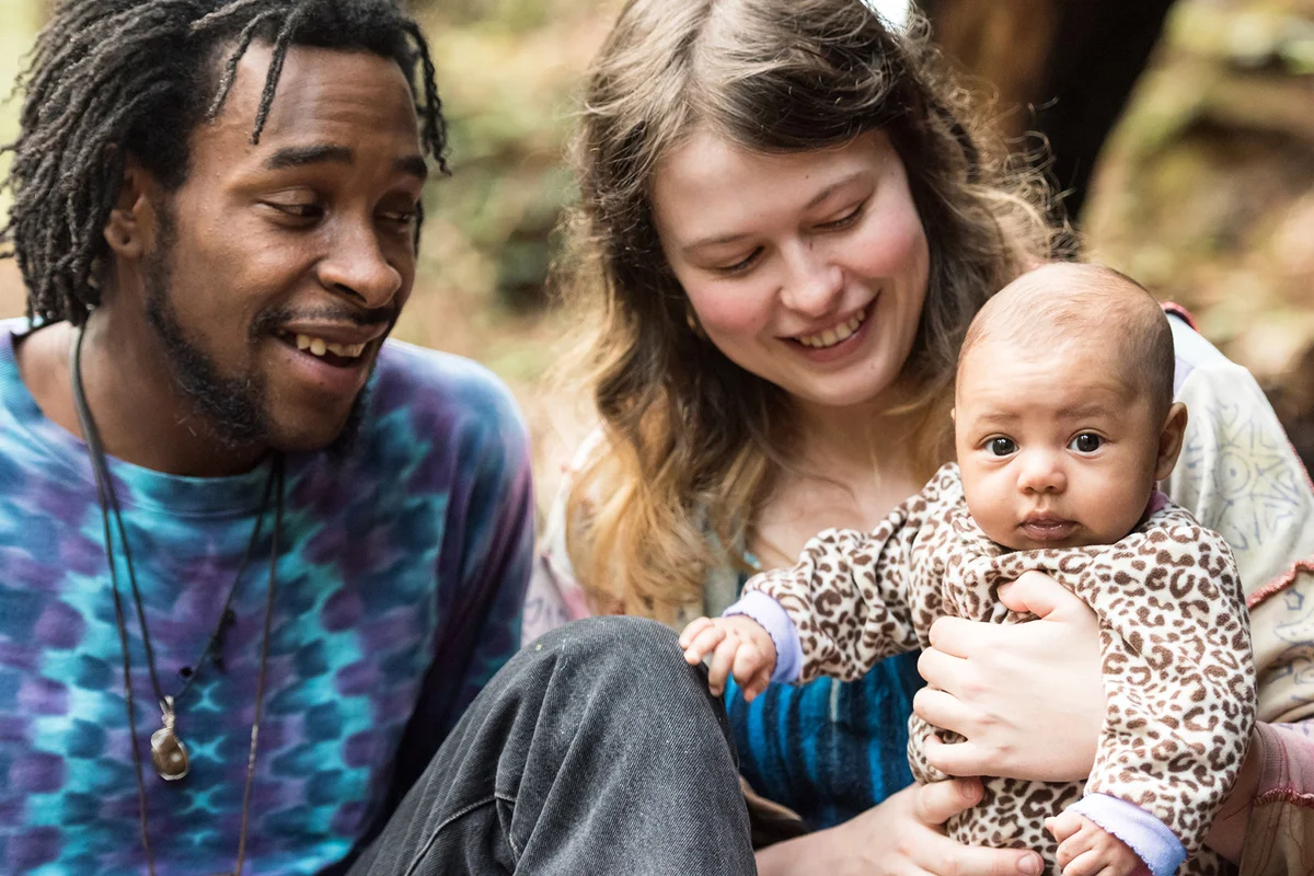 Young hippie family with baby