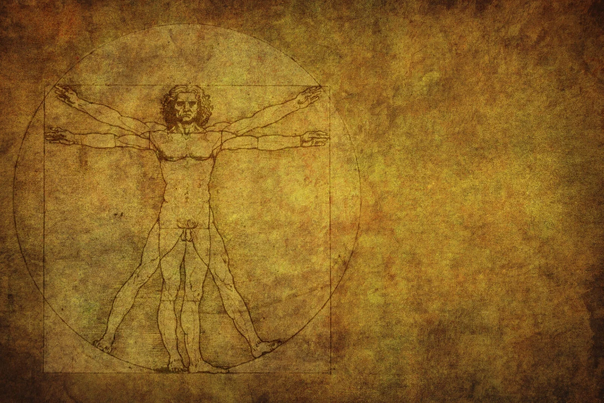 Vitruvian man on gold textured background