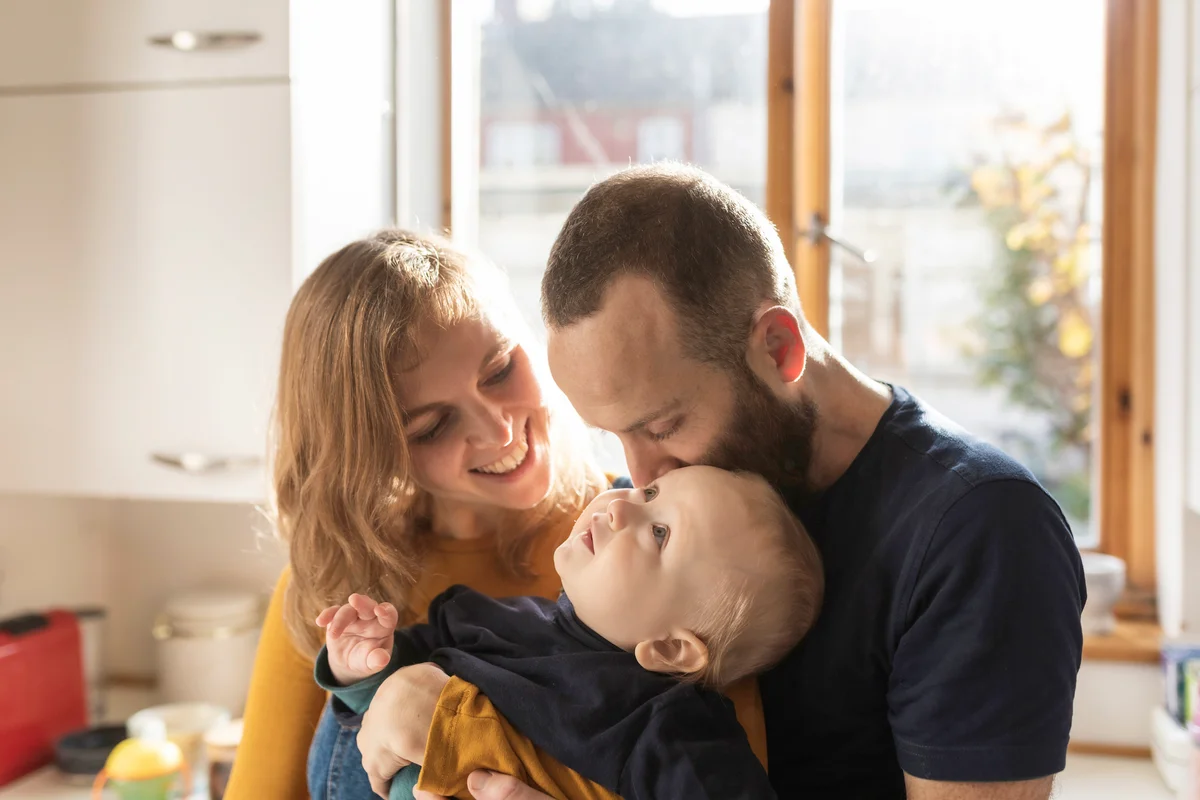 Couple with a baby at home