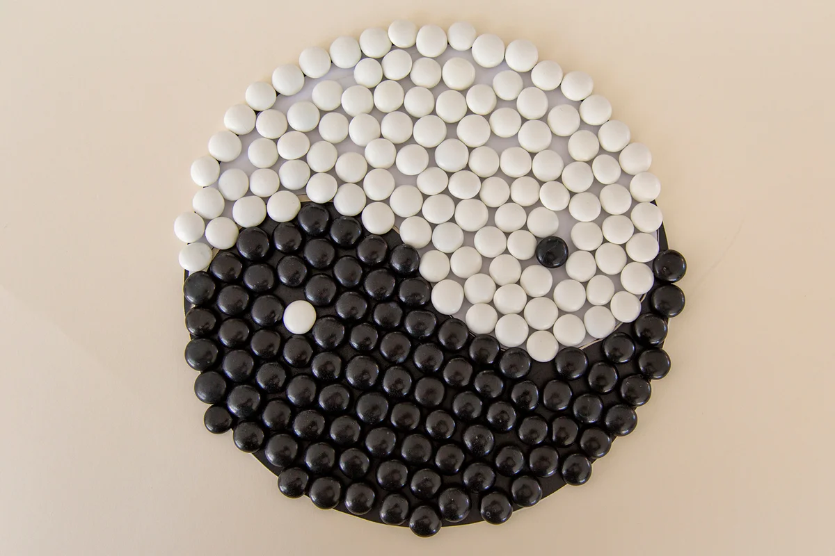 Chocolate Candy in a yin yang graphic.