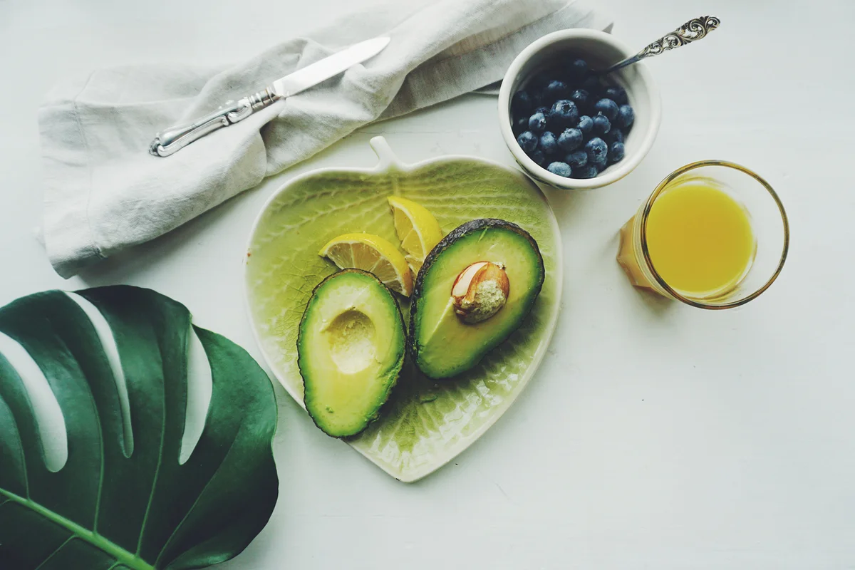 High Angle View Of Breakfast On Table with Avocado