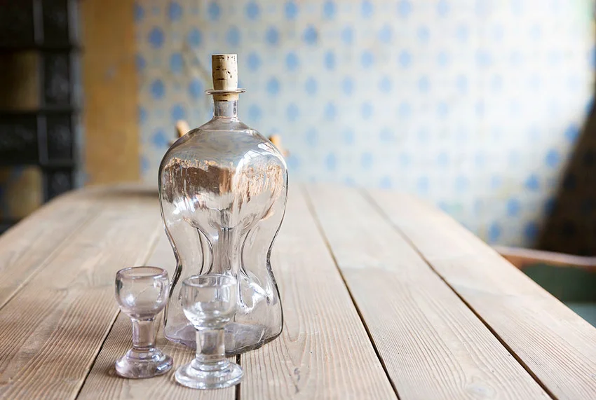 Antique glass decanter and glasses