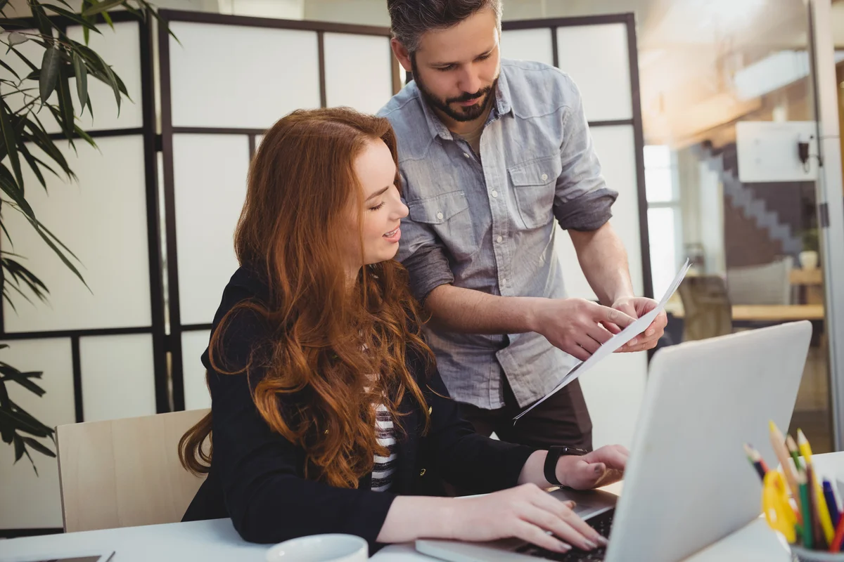 two people review fundraising contract
