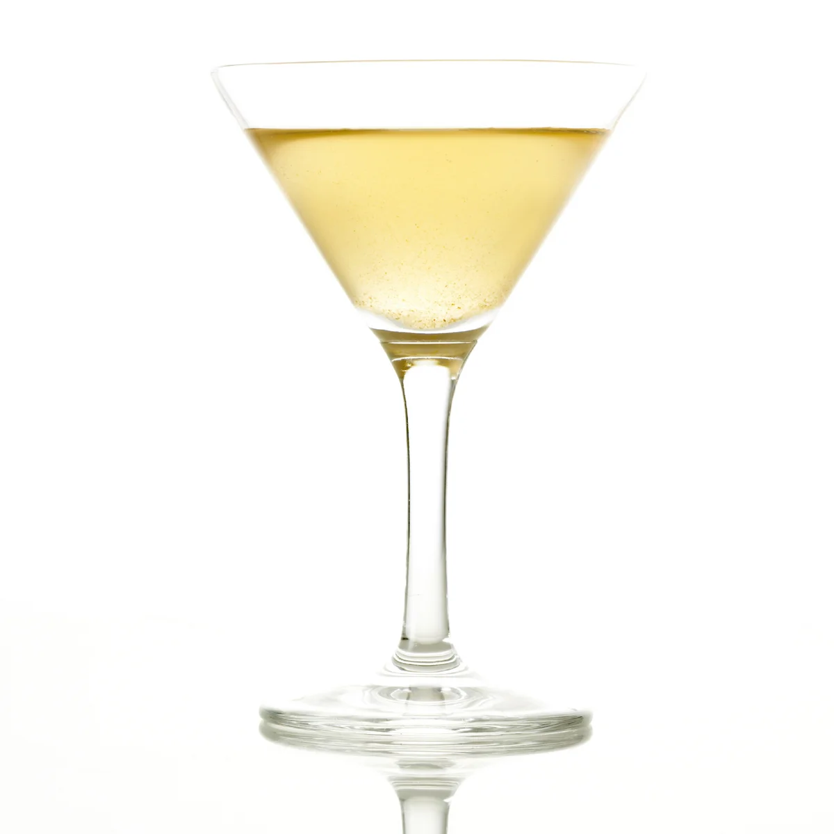 Yellow daisy in a martini glass