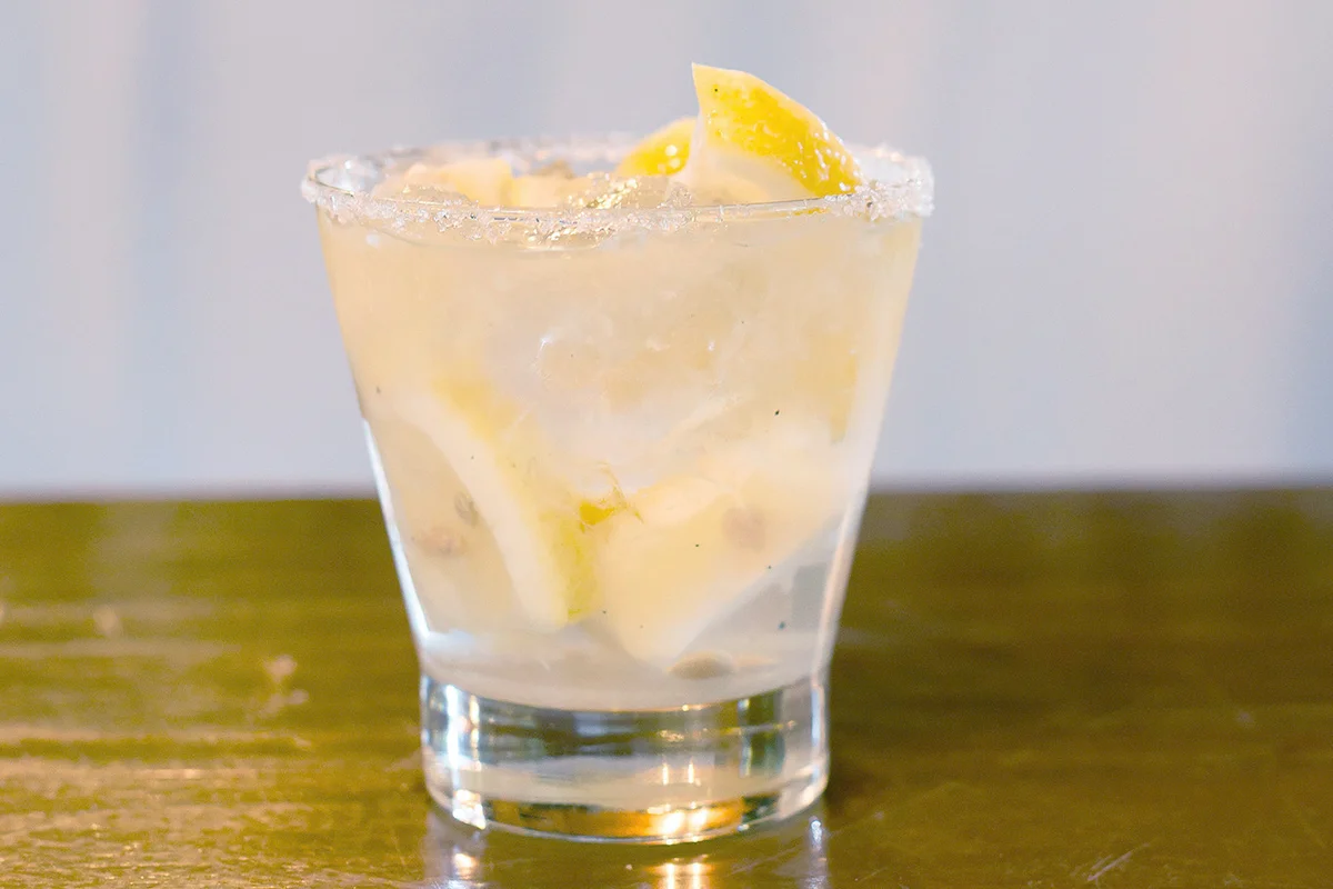 Yellow parrot cocktail on table