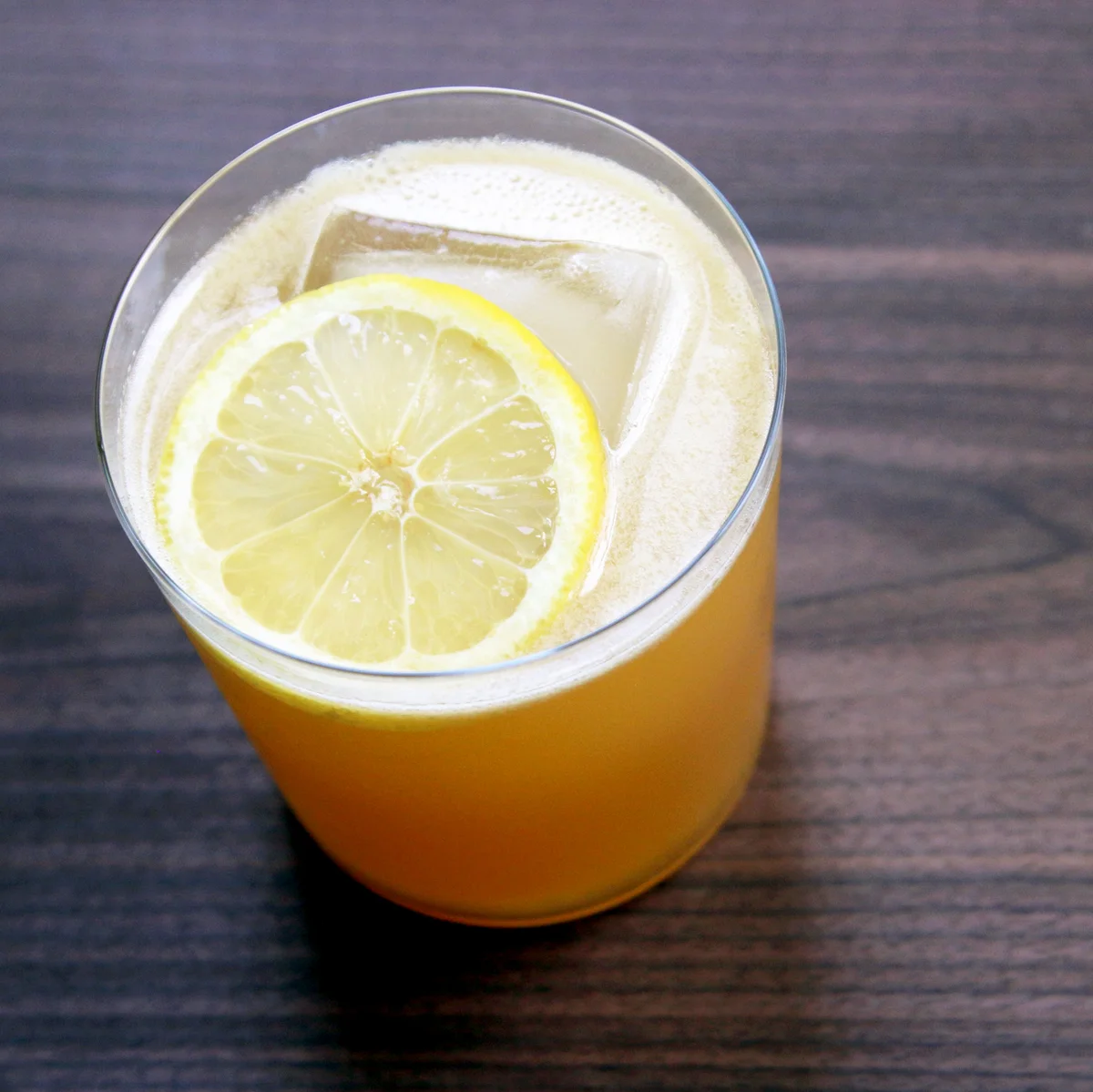 High Angle View Of Cocktail In Glass On Wooden Table