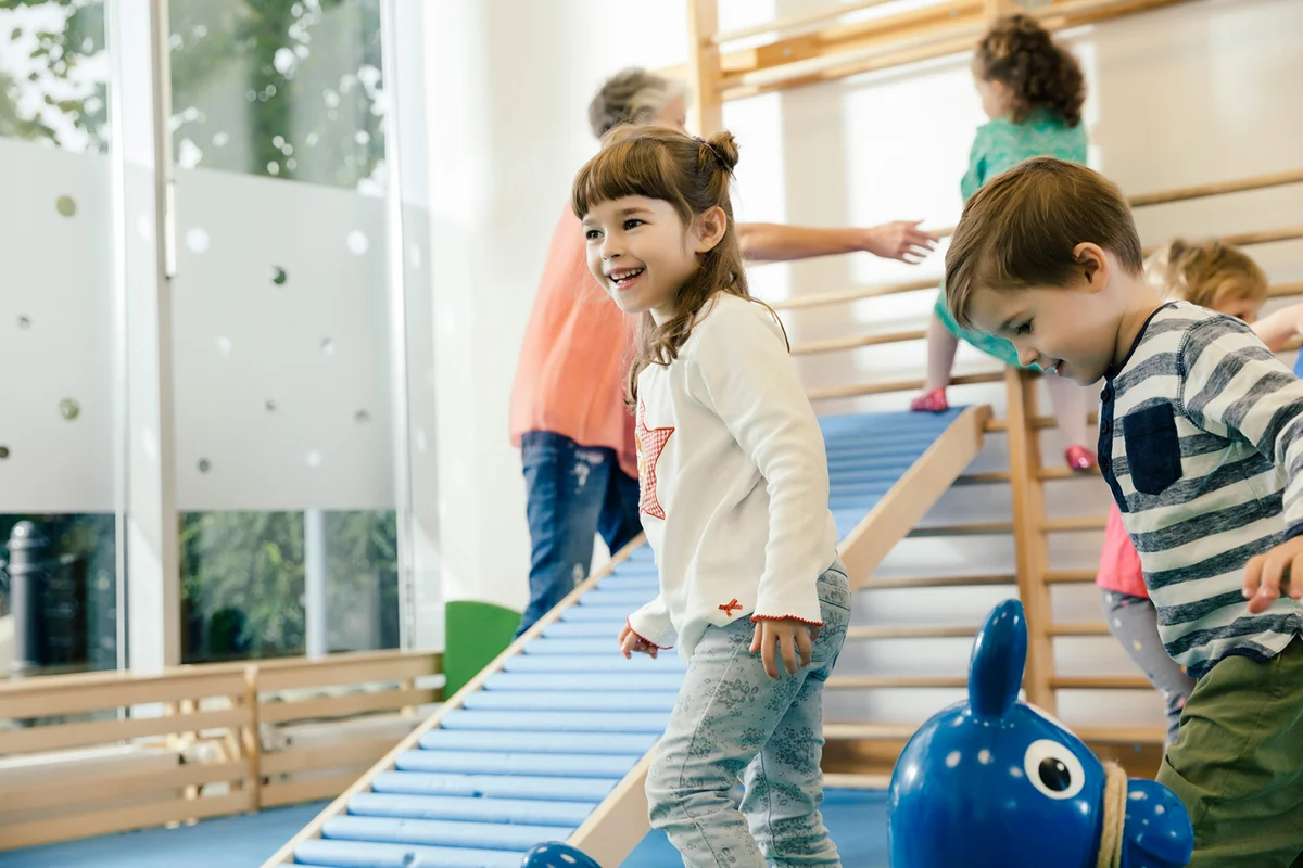 Happy children in gym room
