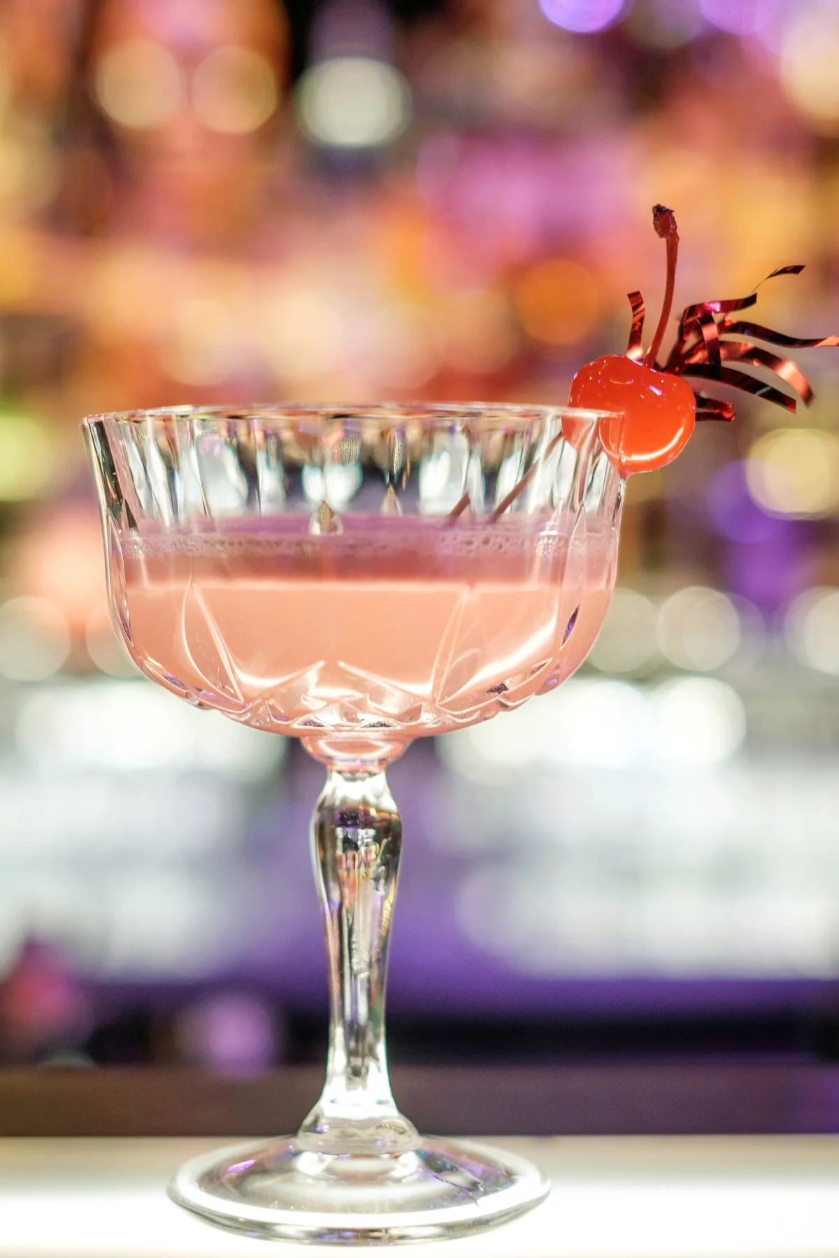 Pink Squirrel Cocktail On Bar Counter