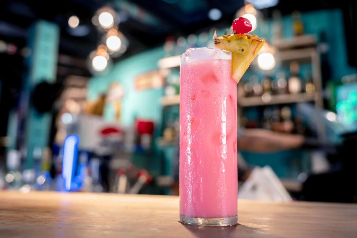 Pink tropical cocktail served at the bar