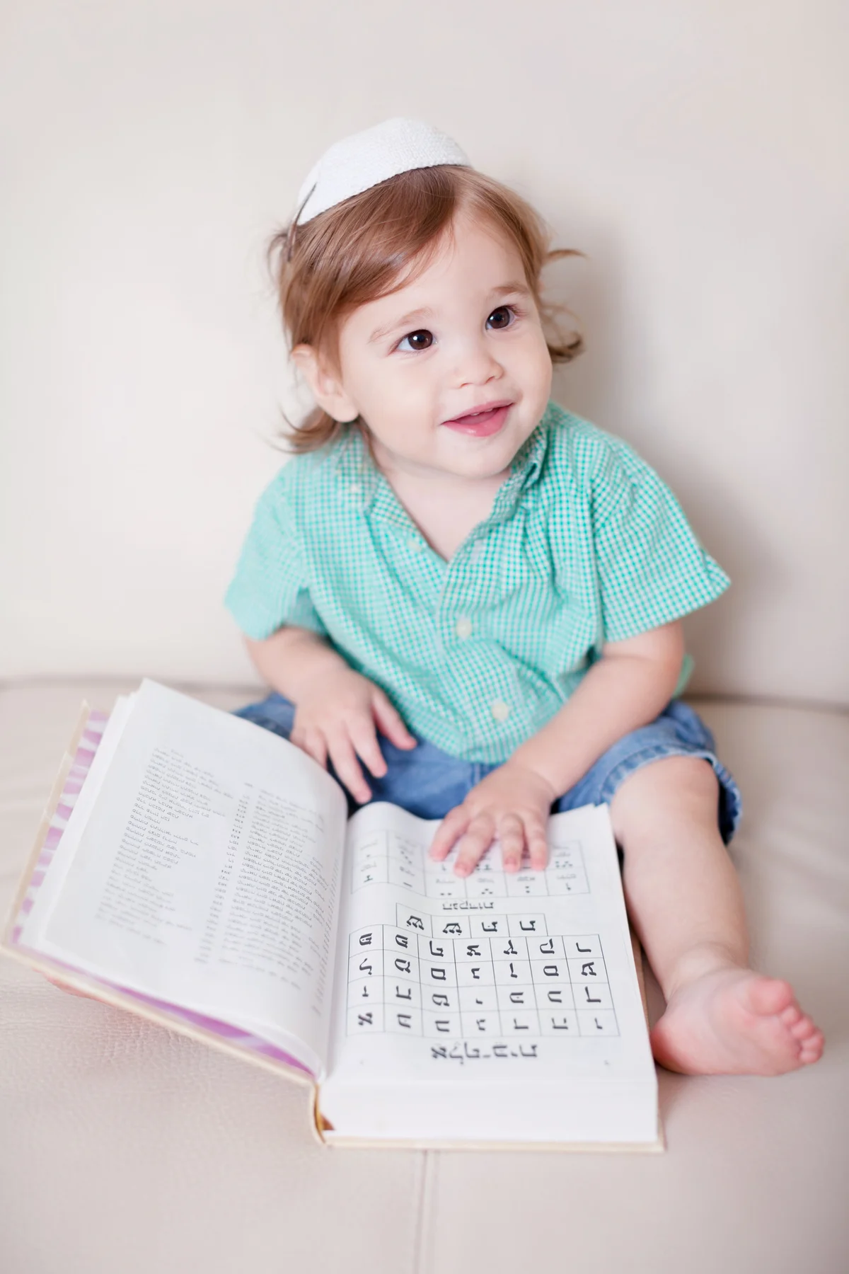 Little boy learning the Aleph Bet