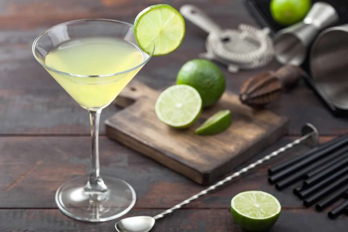 Kamikaze cocktail in martini glass with lime slice