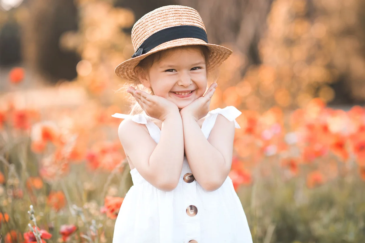 charming southern toddler girl in field