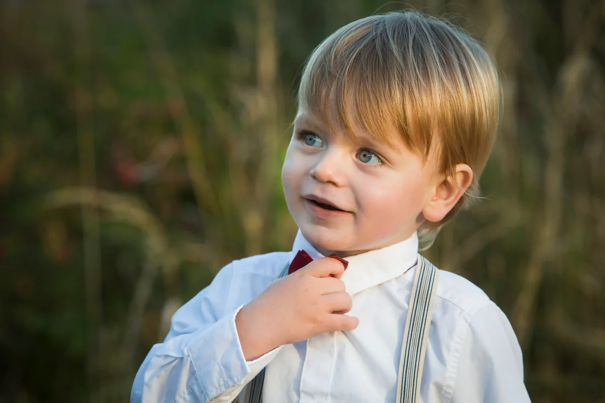distinguished baby boy in dress clothing