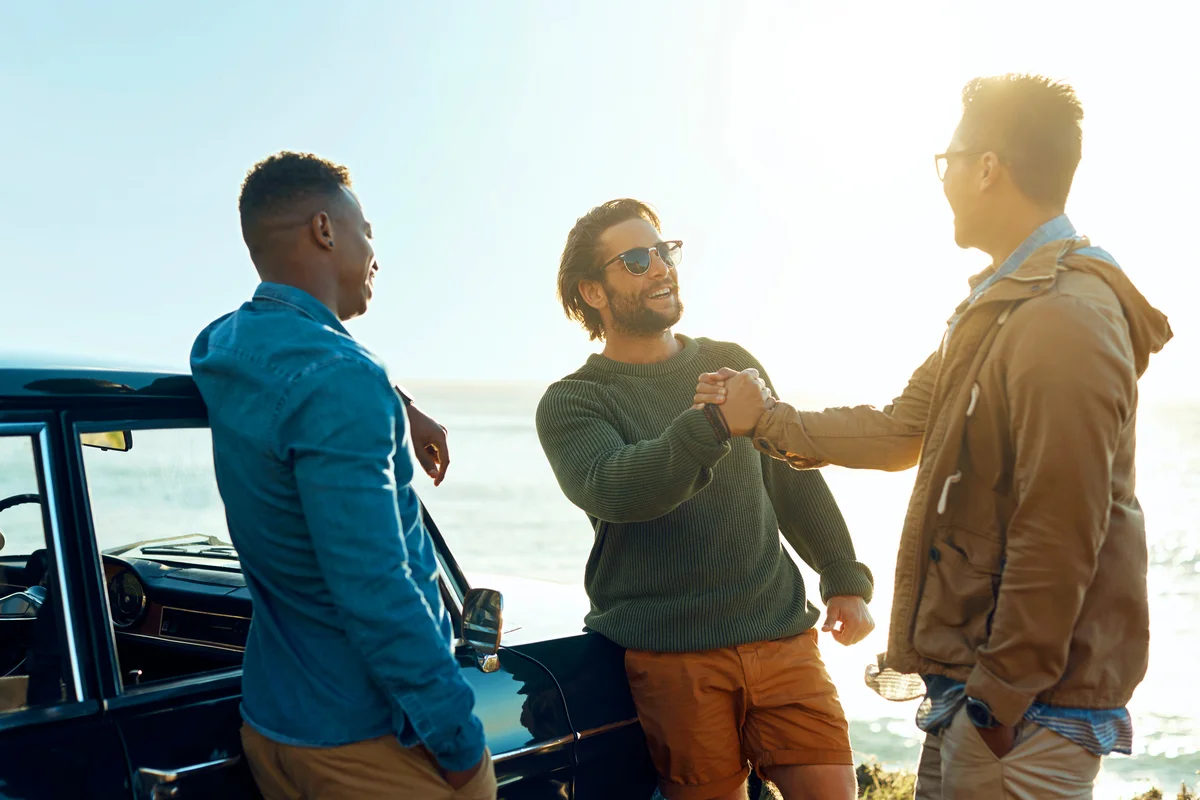 Friends on a road trip along the coast
