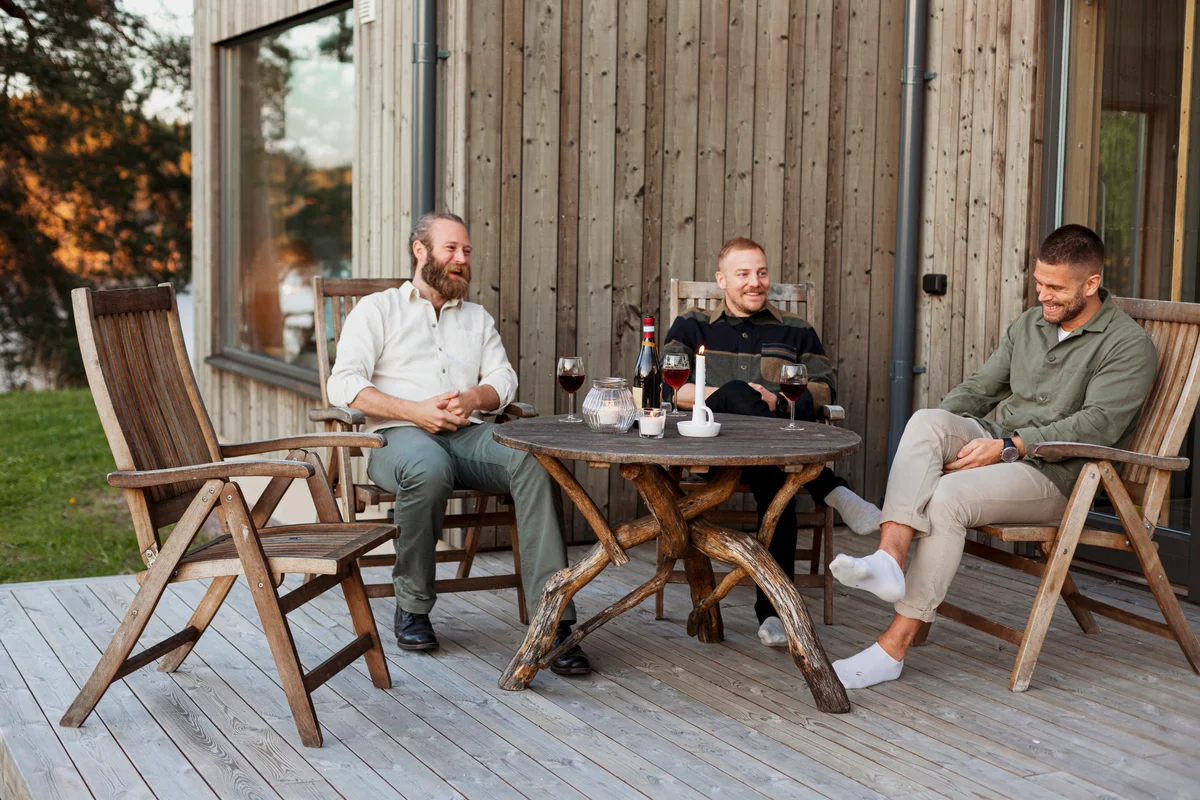Male friends sitting on patio