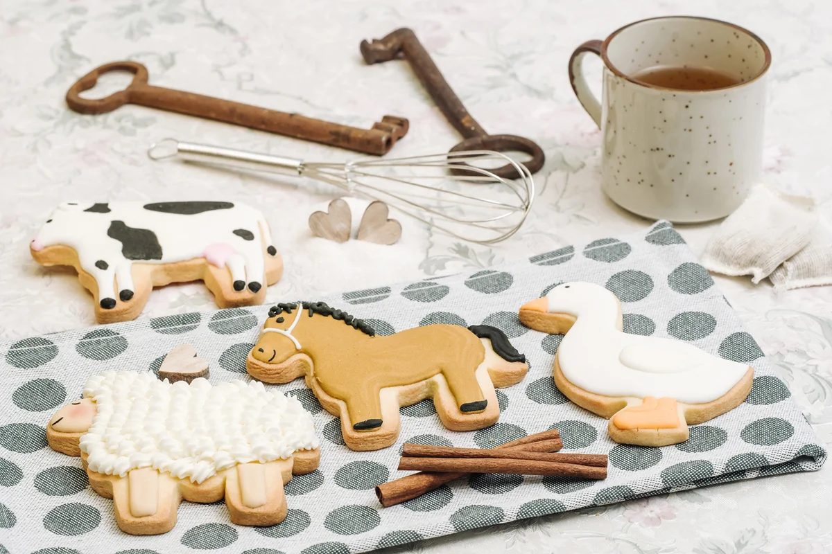 Delicious cookies in shape of farm animals
