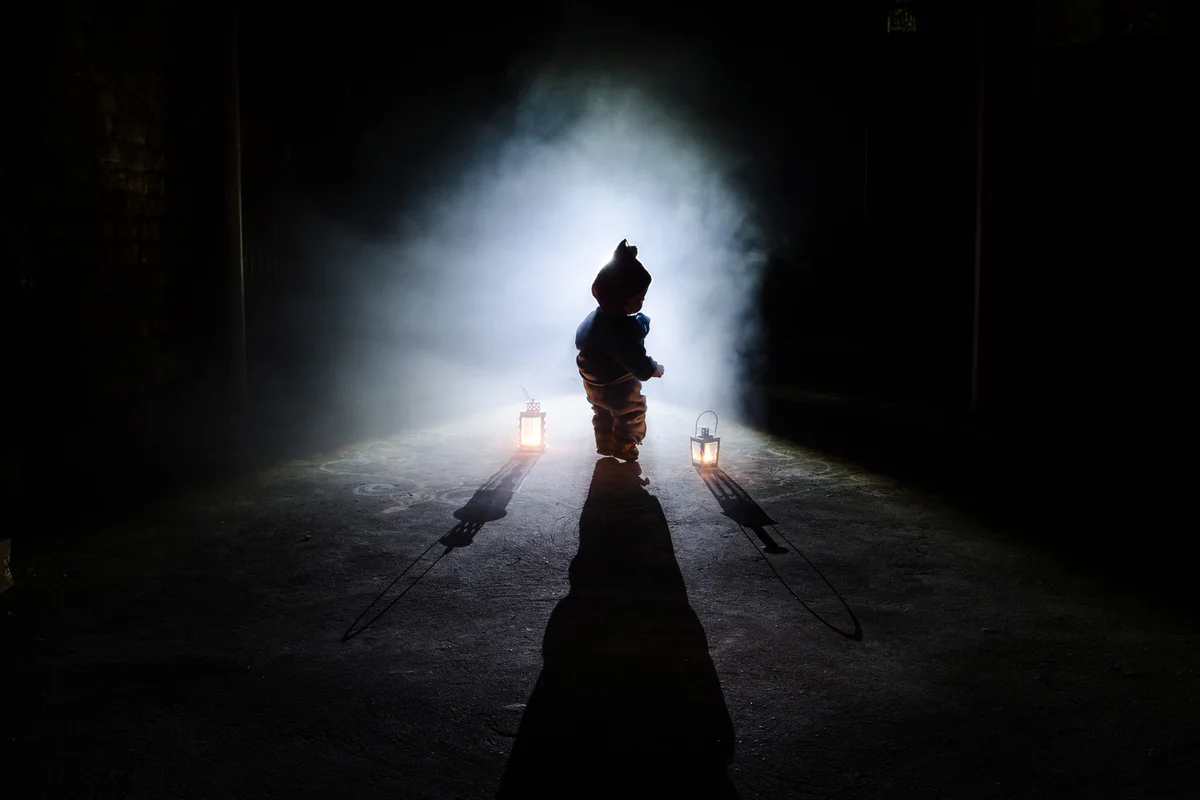Silhouette of scary baby