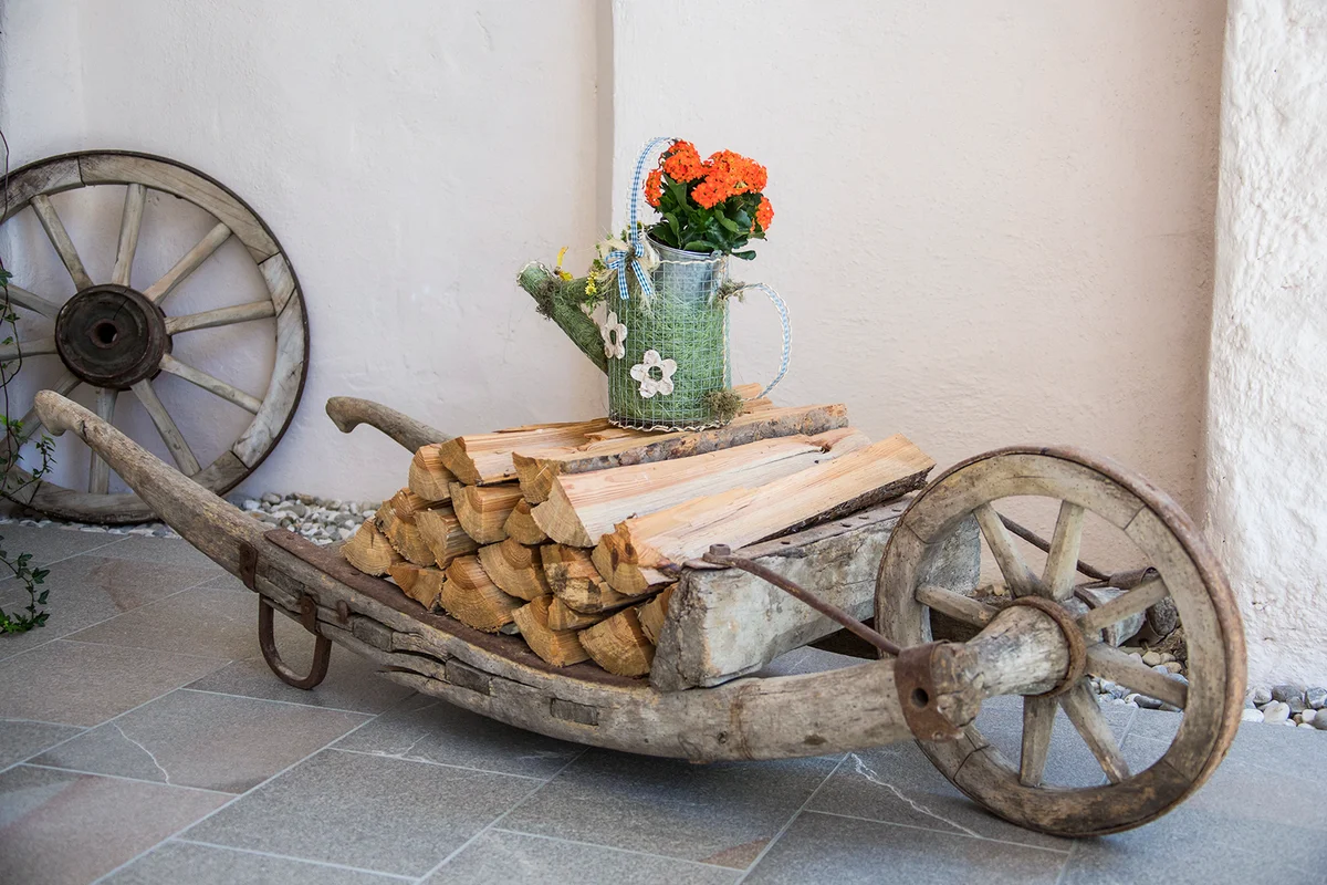 Old traditional pushcart, wheelbarrow with firewood | Getty Editorial Use