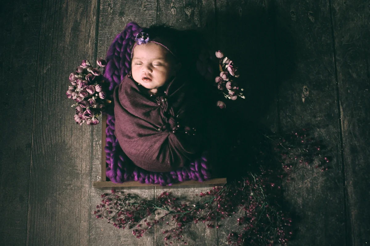 Baby Sleeping By Flowers