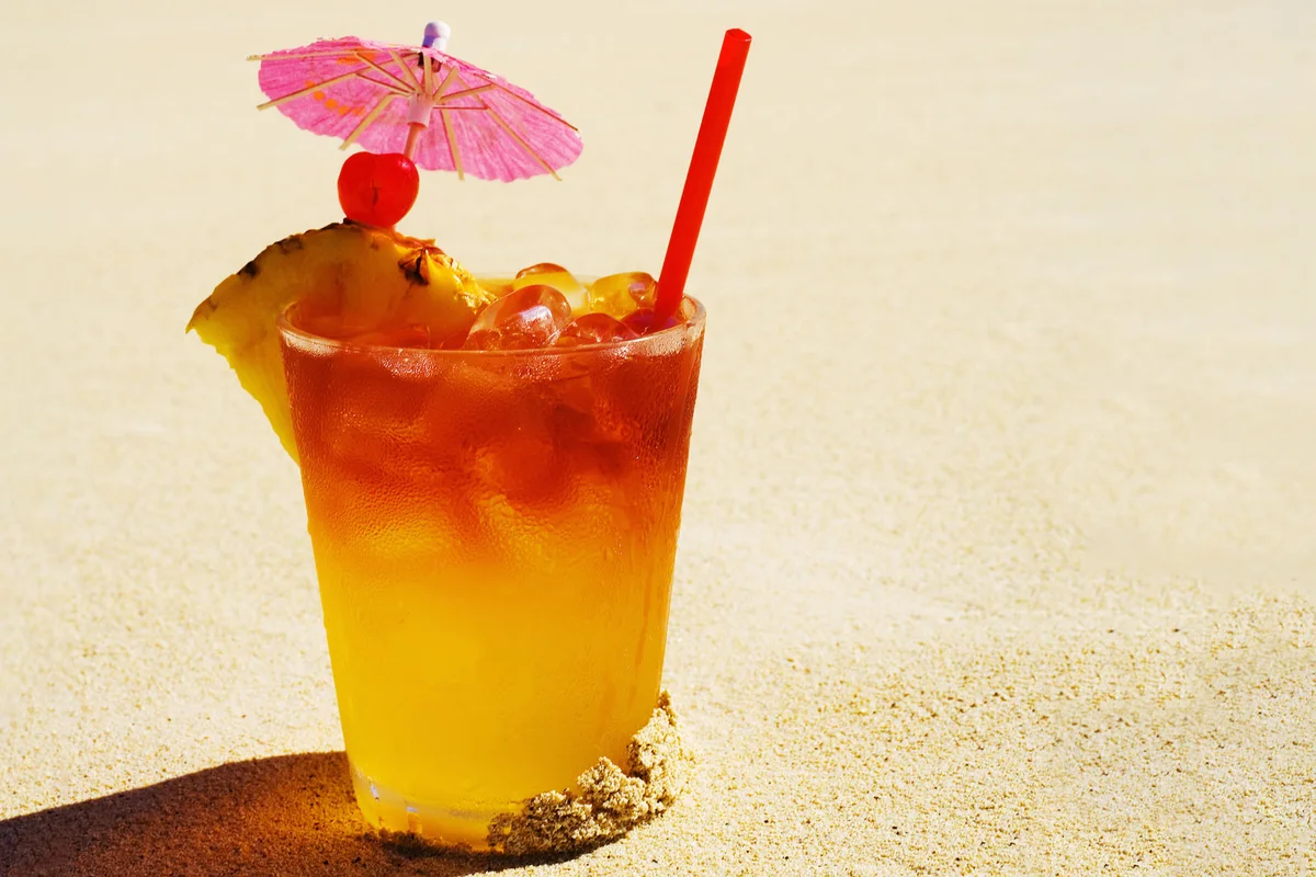 Mai Tai cocktail on beach in sand