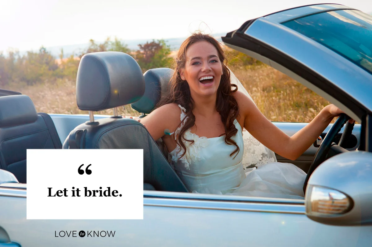 bride smiling in convertible car