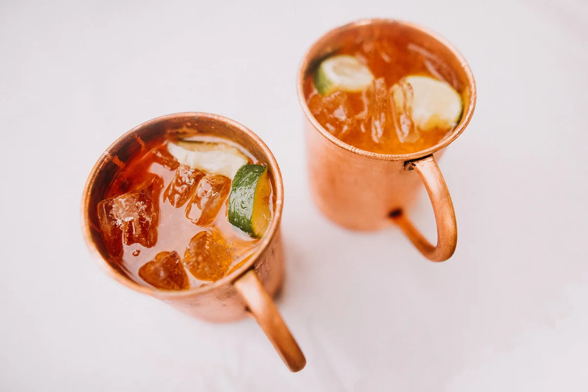 Ice cold refreshing cocktails in copper mug