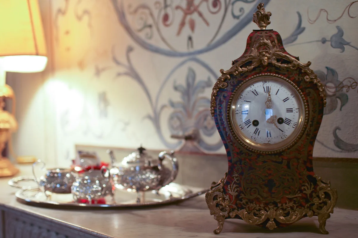 antique clock on table