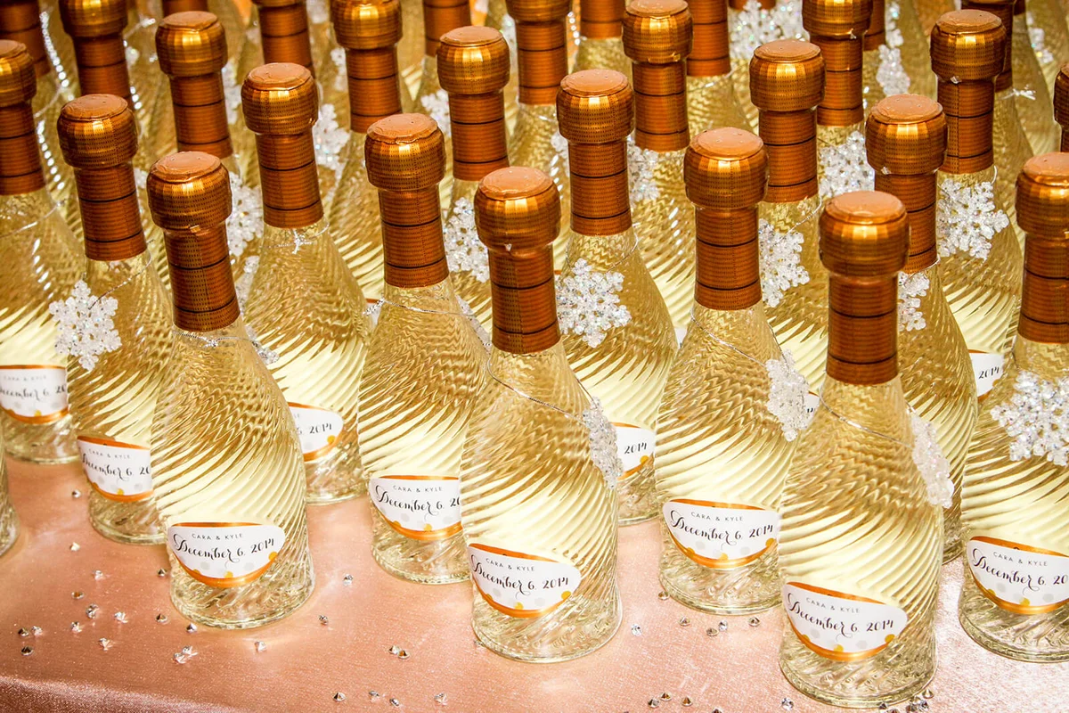 Small Bottles of Wine as Wedding Favors | Photo 117679571 © Jerry Coli | Dreamstime.com